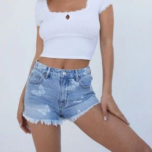 Pacsun Butterfly print denim festival shorts